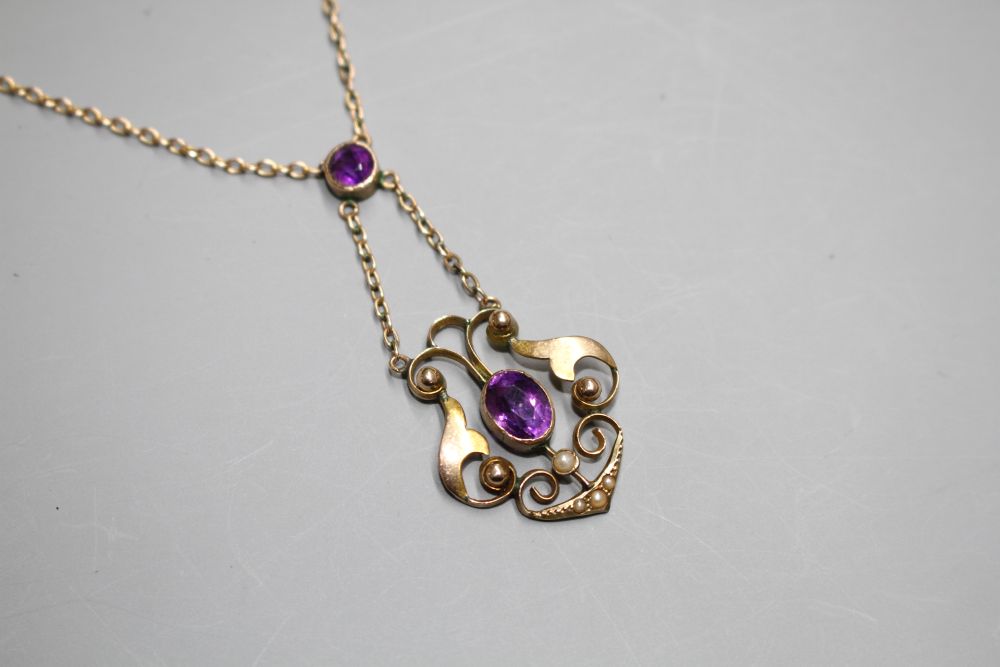 An Edwardian 9ct, amethyst and seed pearl set pendant necklace,